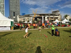 A young walker enjoys the Racing Heart obstacle course.